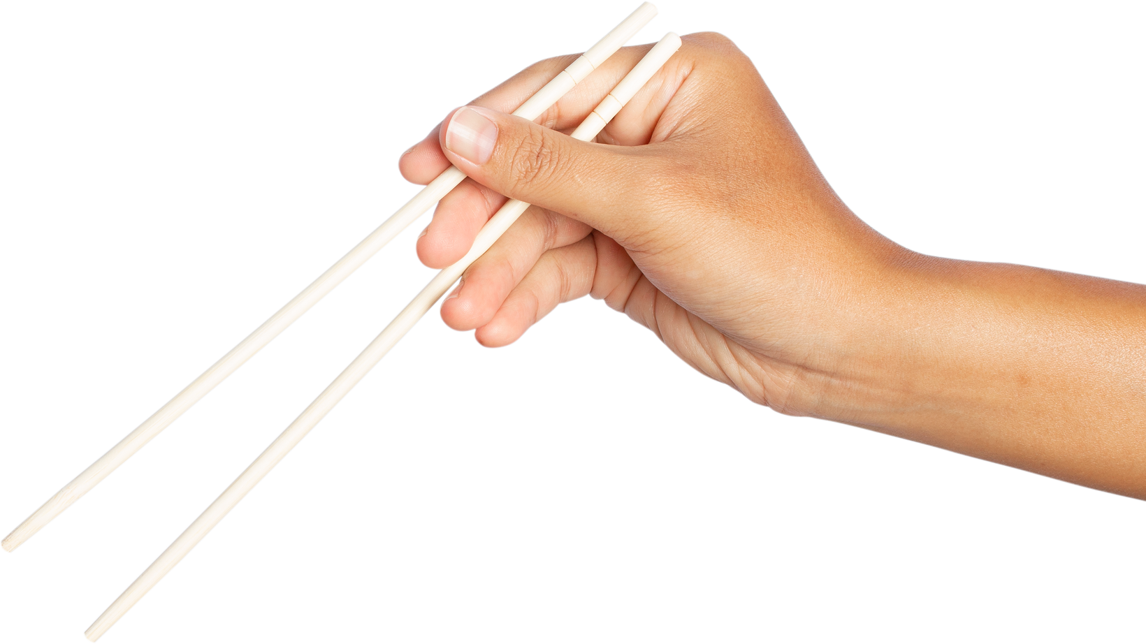 Hand Holding Wooden Chopsticks.